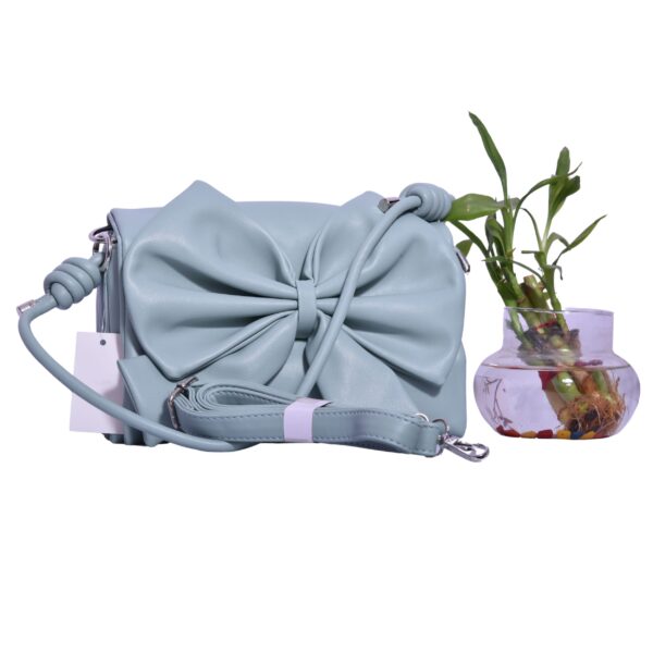 Sky blue bow sling bag with dual straps by PurseLatino