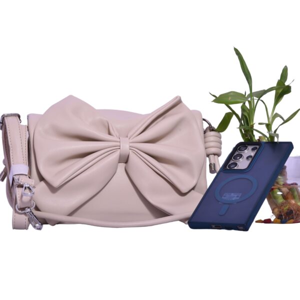 Cream bow sling bag with dual straps and soft leather by PurseLatino