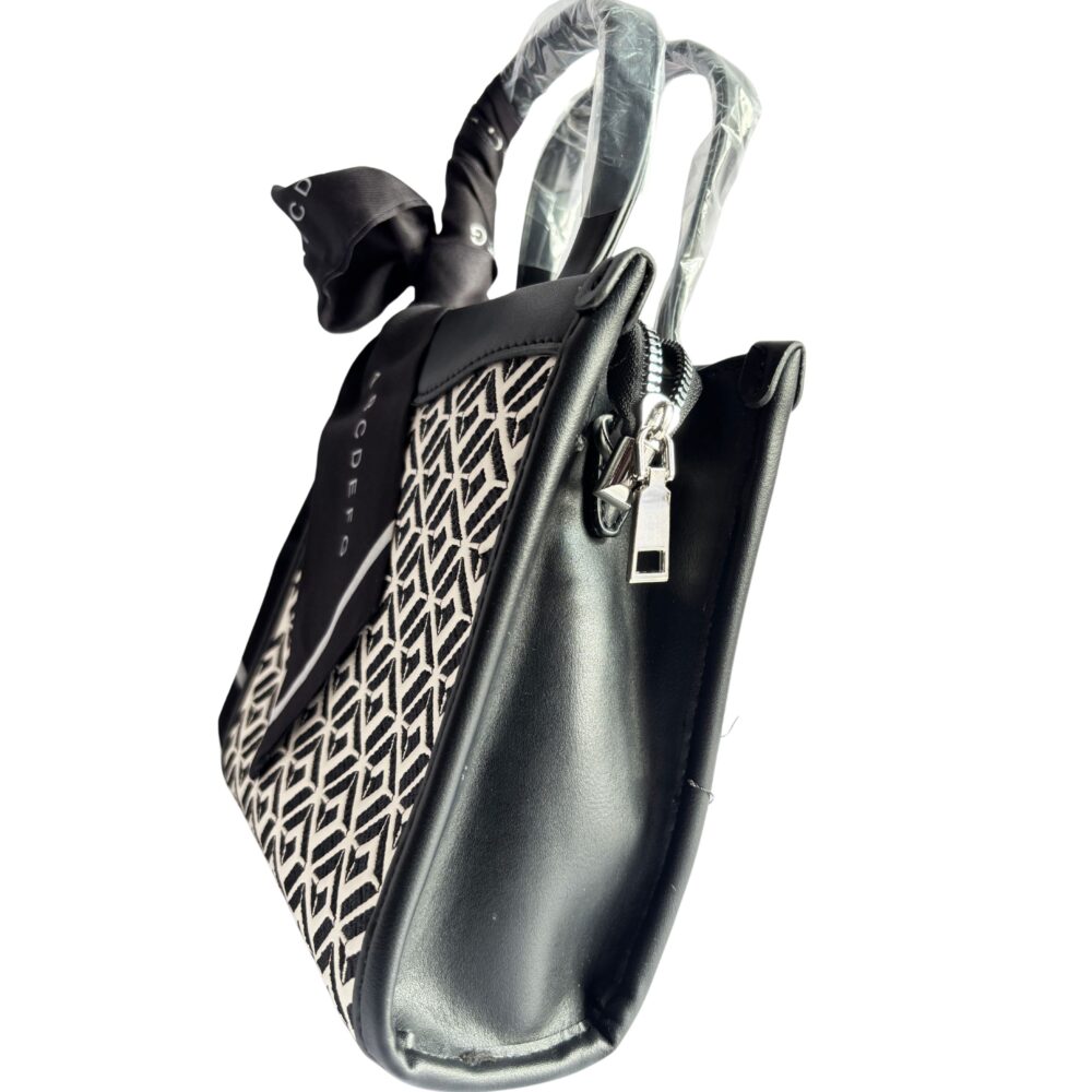 Eclipse Curve – Black Sling & Handbag