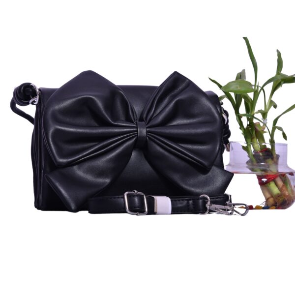 black bow sling bag with faux leather and chain strap