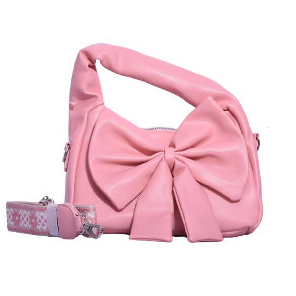 peach shoulder bag with front bow and strap