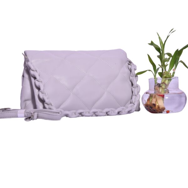 lavender quilted shoulder bag with braided handle and adjustable strap